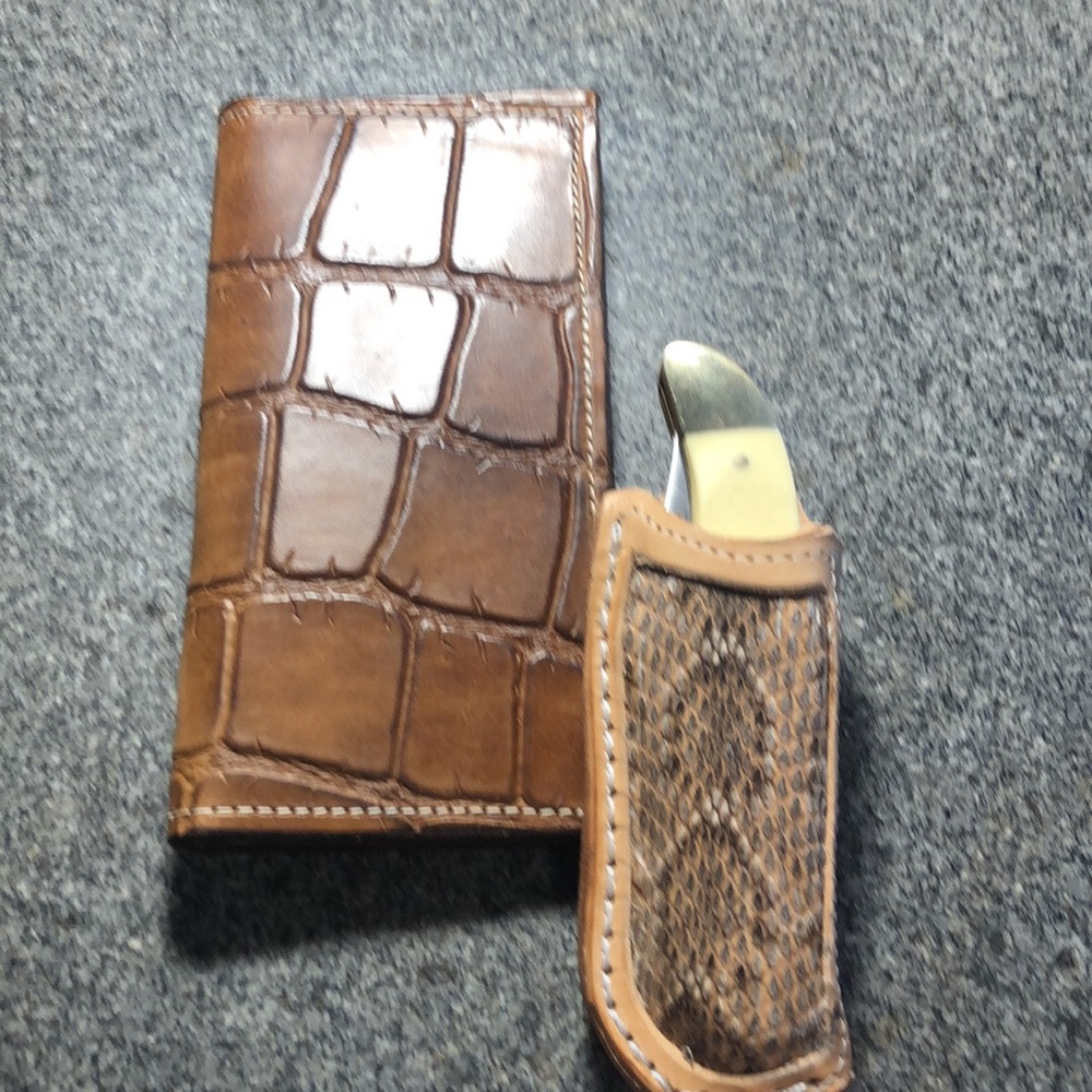 Old timer large trapper. Wallet in gator belly. And rattler inlay holster